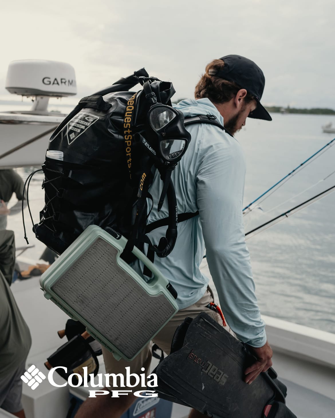 Man wearing PFG boarding a fishing boat.