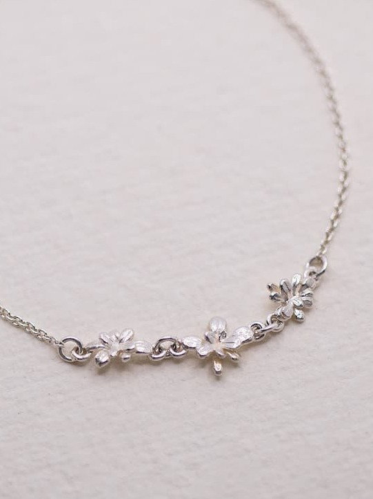 Linked Sprouting Rosette Inline Bracelet