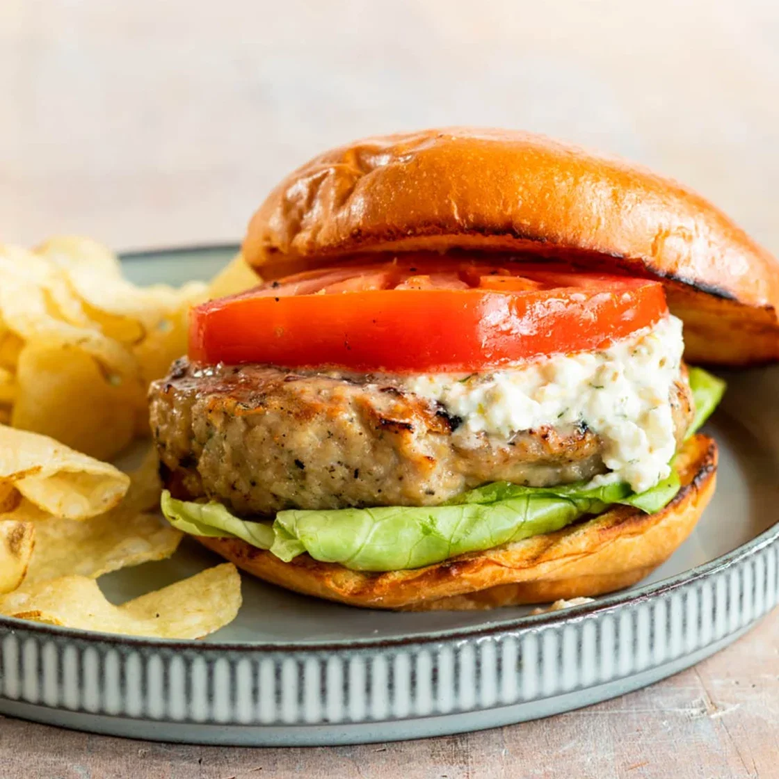 Greek Chicken Burgers with Feta Sauce and Marinated Tomatoes 