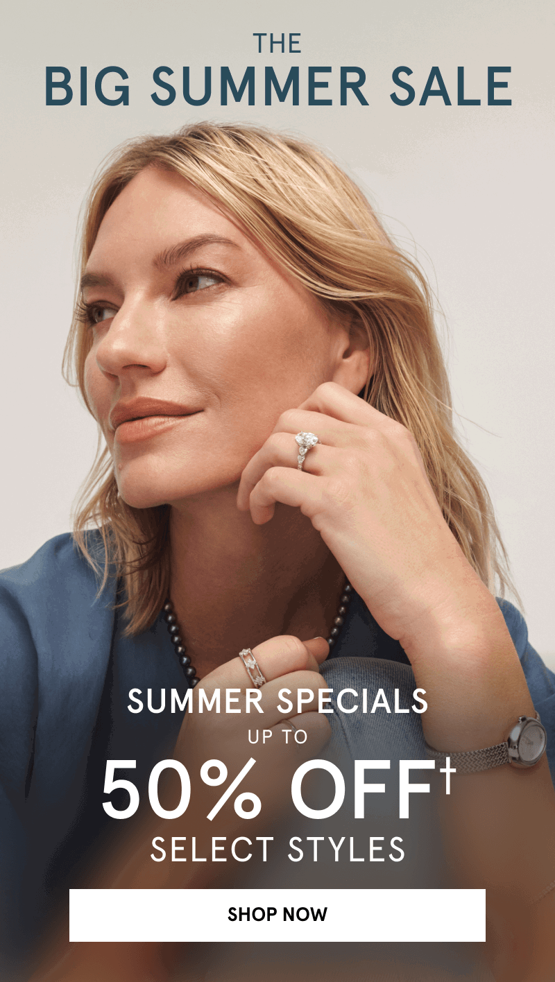 Woman wearing diamond rings, a necklace and watch. Summer specials, up to 50% Off select styles. Click shop now.