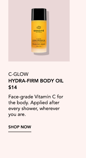 Travel-size C-Glow Hydra-Firm Body Oil with Vitamin C for post-shower body care.