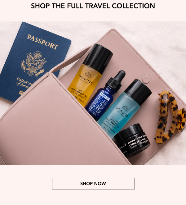 Odacité travel skincare essentials tucked inside a pink travel bag beside a passport and hair clip.