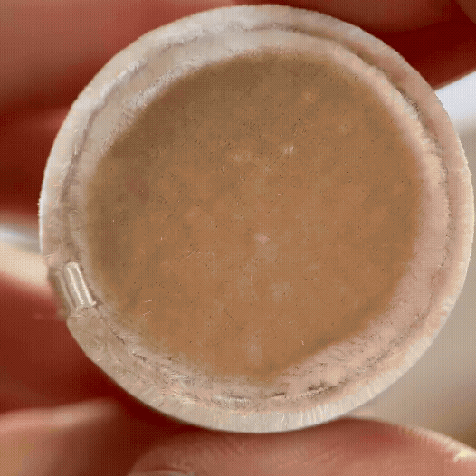 Gif of a new Elixir Ring from the Watercolors Drop shown in a round ring box