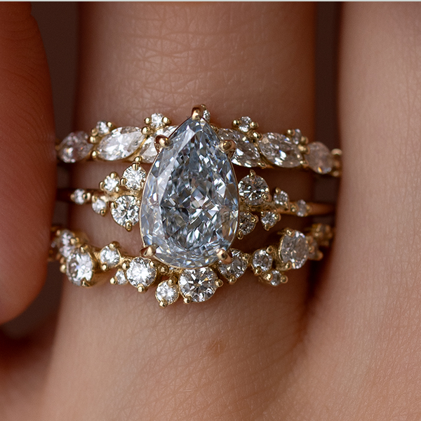 Image of a new Snowdrift Ring from the Watercolors Drop shown being worn by a model