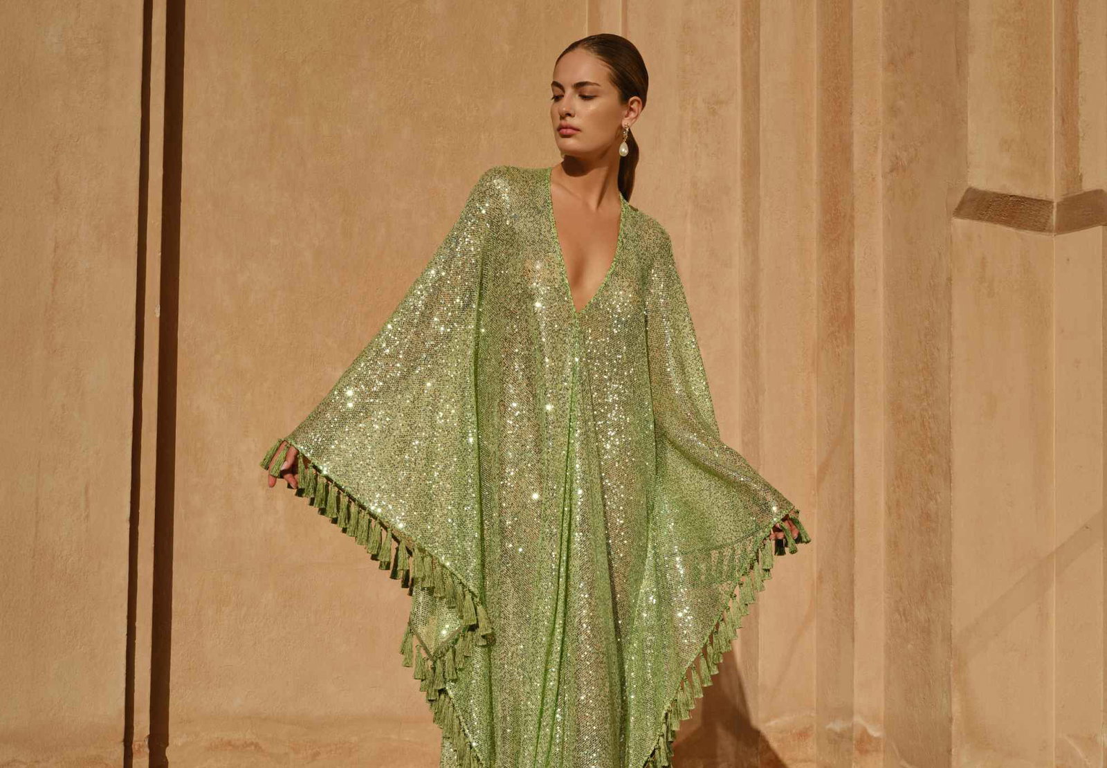 From relaxed tailoring to flowing dresses and evening sandals, find everything you need for the season ahead