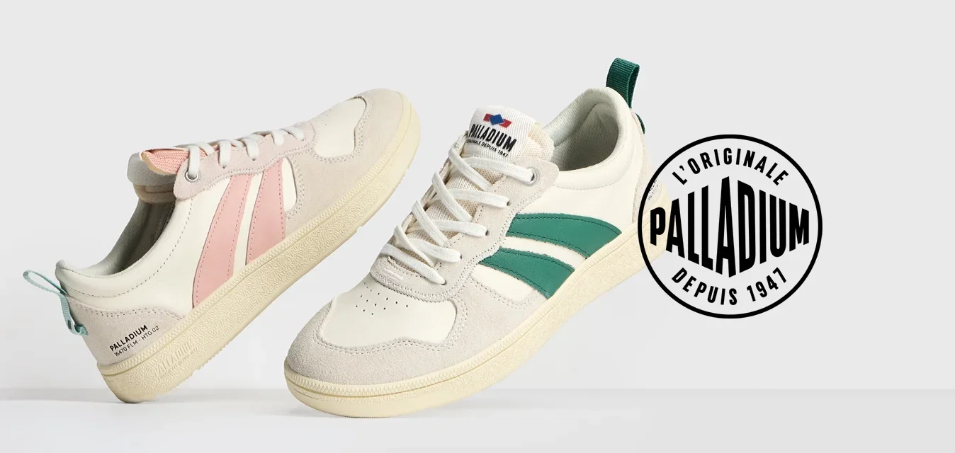 Lichtgekleurde sneakers in crème met roze en groene accenten, van leder, ronde neus, rubberen zool en contrasterende zijkanten.