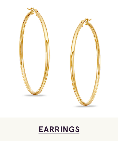 A pair of gold hoops. Click here to shop earrings