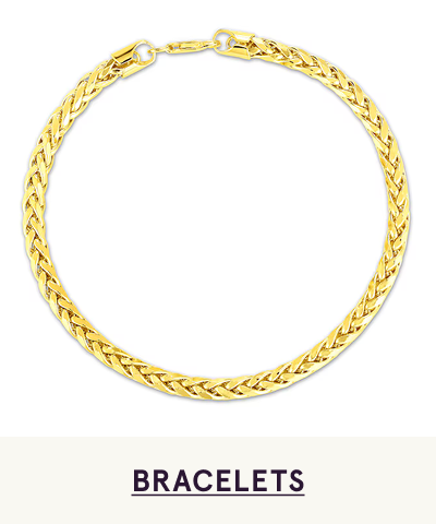 A gold bracelet with a braided chain design. Click here to shop bracelets