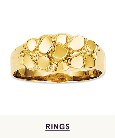 A gold ring with an intricate nugget design. Click here to shop rings