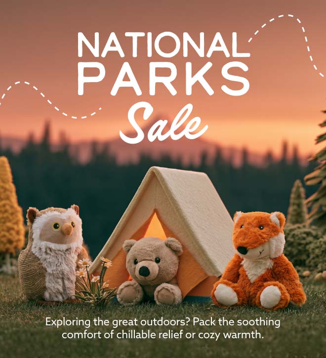 National Parks Warmies in a woodland tent. Shop Sale.