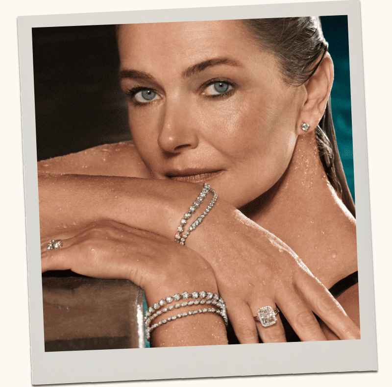 Polaroid of model wearing lab grown diamond jewelry. 
