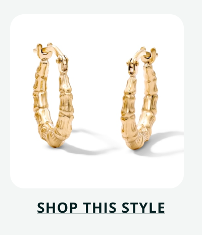 Gold bamboo style hoops. Click here to shop this style