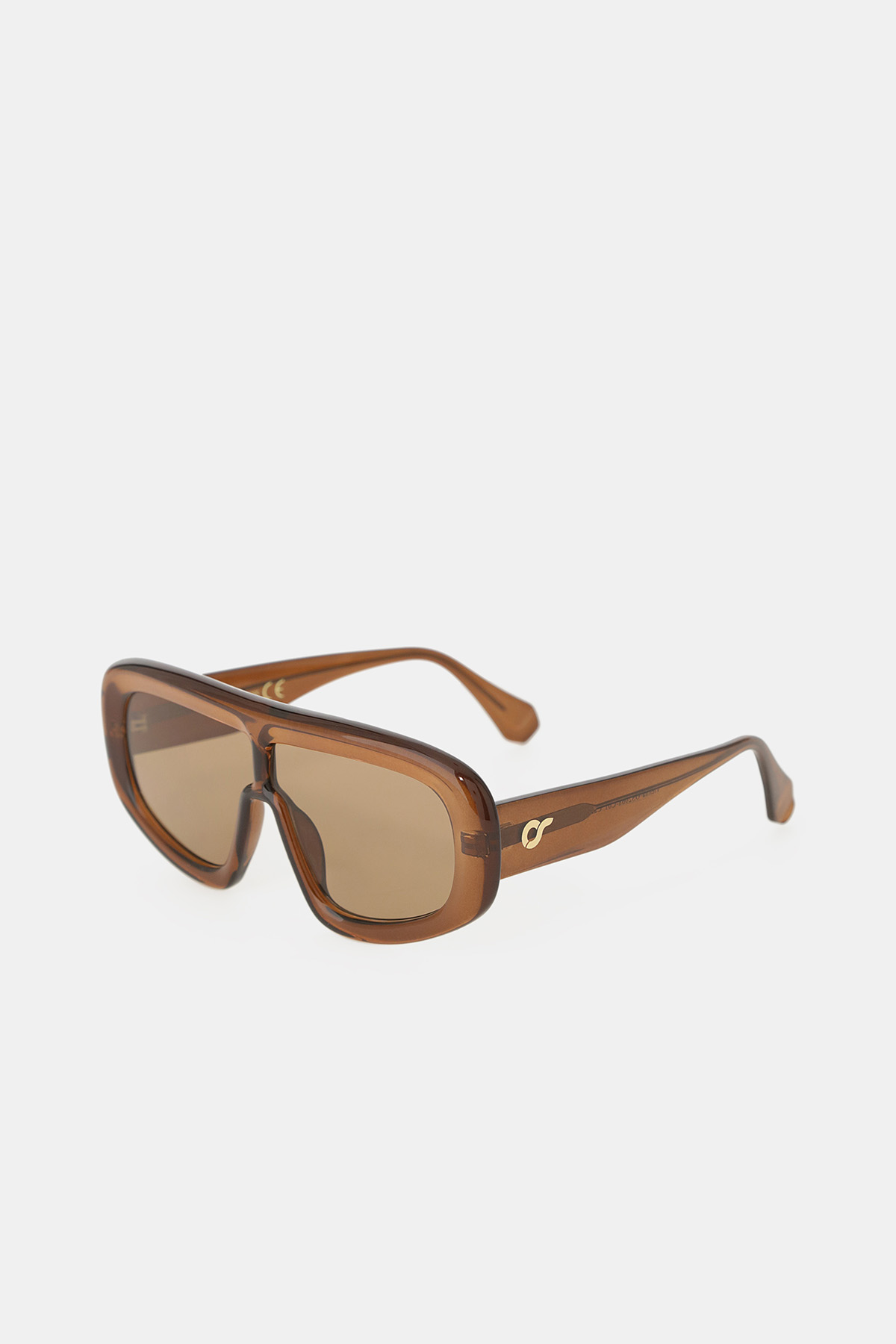 Brown oversized shield sunglasses with glossy acetate frame and gold temple logo, angled on white background