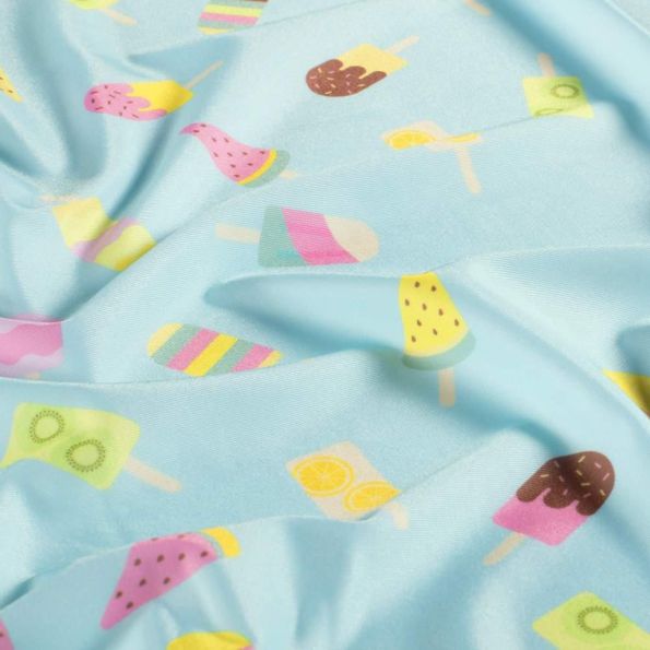 Tissu Lycra maillot de bain Fizzy sur fond Bleu pastel