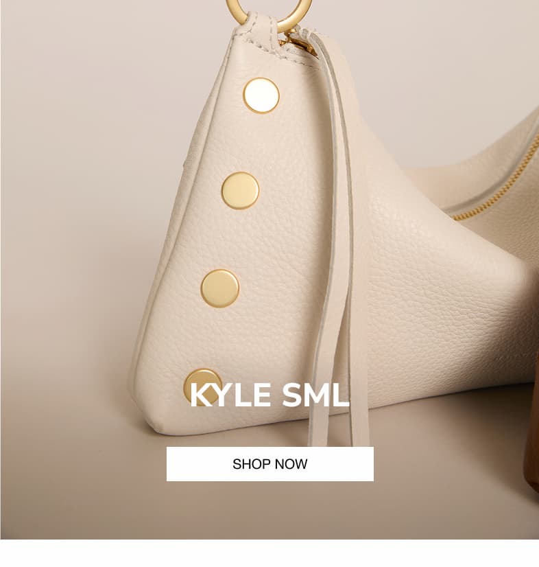 Close-up of the Hammitt Kyle Sml in Calla Lily White pebbled leather.