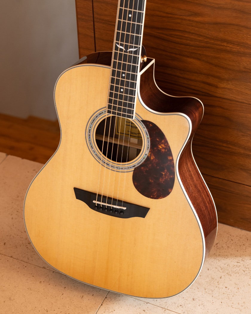 Cleo with torrefied spruce top and tortoise pickguard