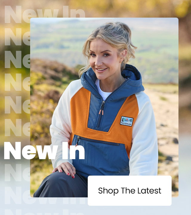 New arrivals outdoor clothing banner with a person wearing a colour-block fleece jacket and a “Shop The Latest” button.