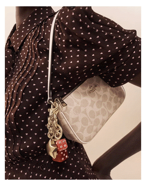Turn up the charm. Personalize your bag with true-to-you charms (the more, the merrier). 