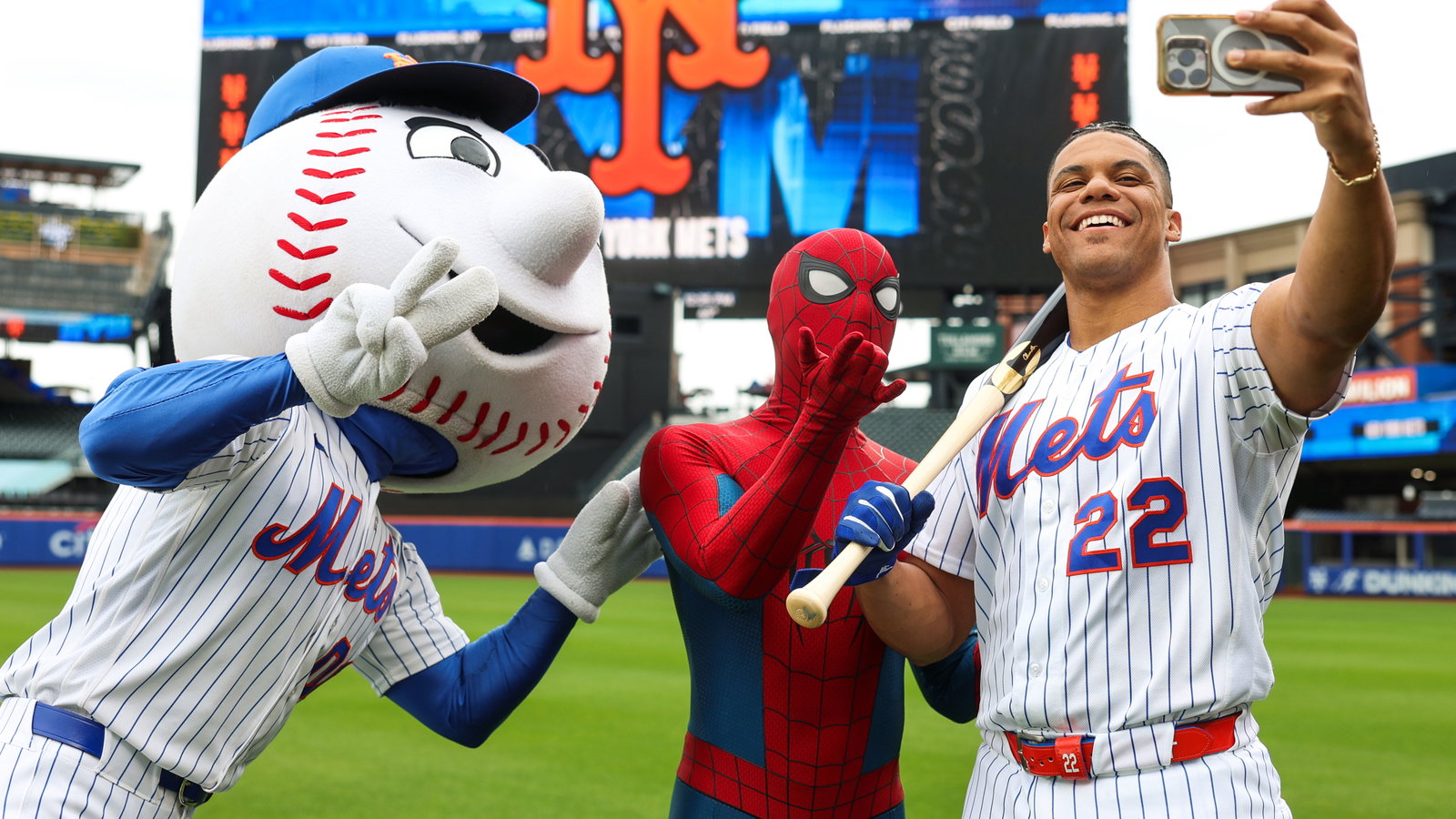 Juan Soto takes a selfie with Mr. Met and Spider-Man