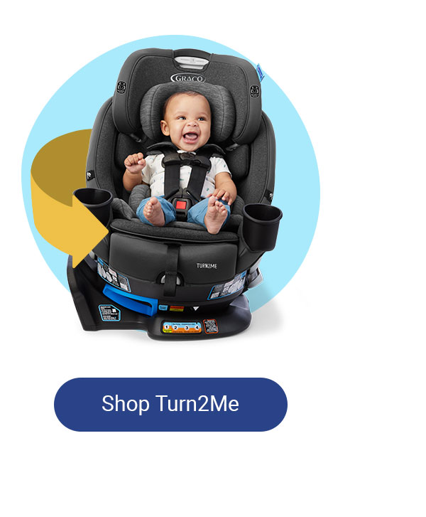 Smiling baby in a Turn2Me car seat. Shop Turn2Me.