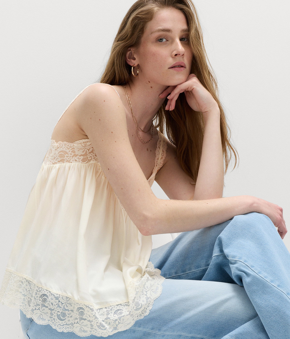 Woman wearing Soft White Lace Detail Cami Top