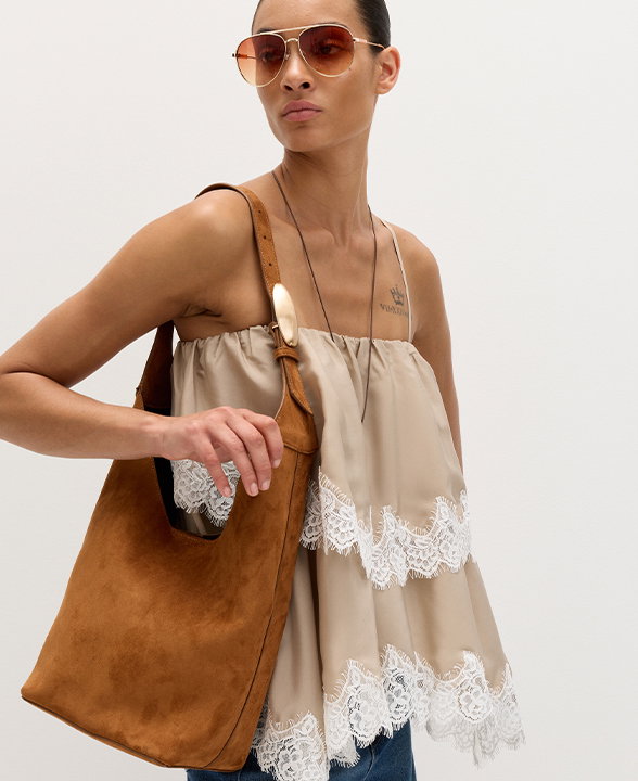 Woman wearing Ivory Lace Detail Cami Top