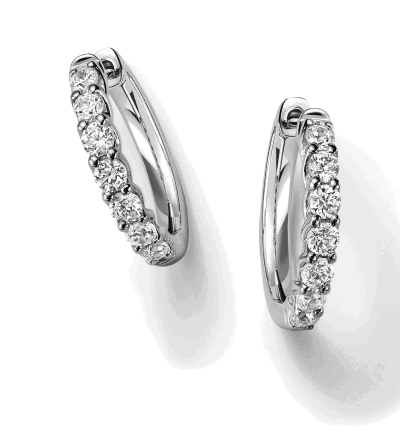 White gold diamond hoop earrings with a row of round diamonds.