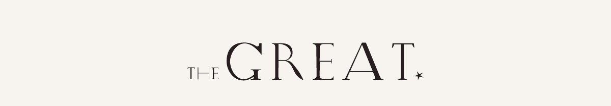 THE GREAT. logo in dark brown serif lettering centered on a soft cream background, with a small star symbol following the brand name.