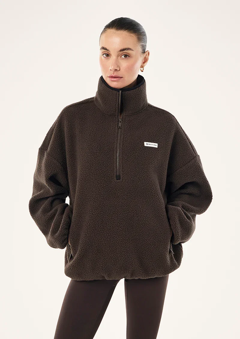 Image of ROTATE QUARTER ZIP IN COFFEE