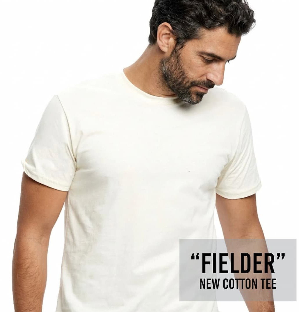 Man in a cream made in usa tee shirt