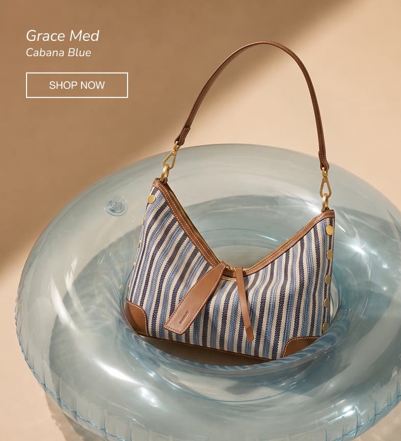 Hammitt Grace Med in Cabana Blue striped woven fabric with tan leather trim.