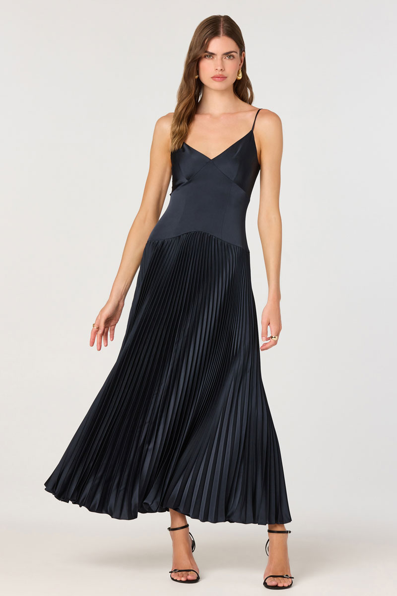 Woman Wearing Pleated Drop Waist Maxi Dress