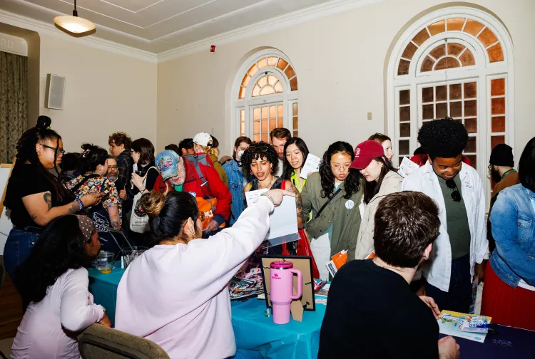 People participate in the Philadelphia Activities Fair at the Philadelphia Ethical Society on April 12, 2026. Hannah Beier for Vox