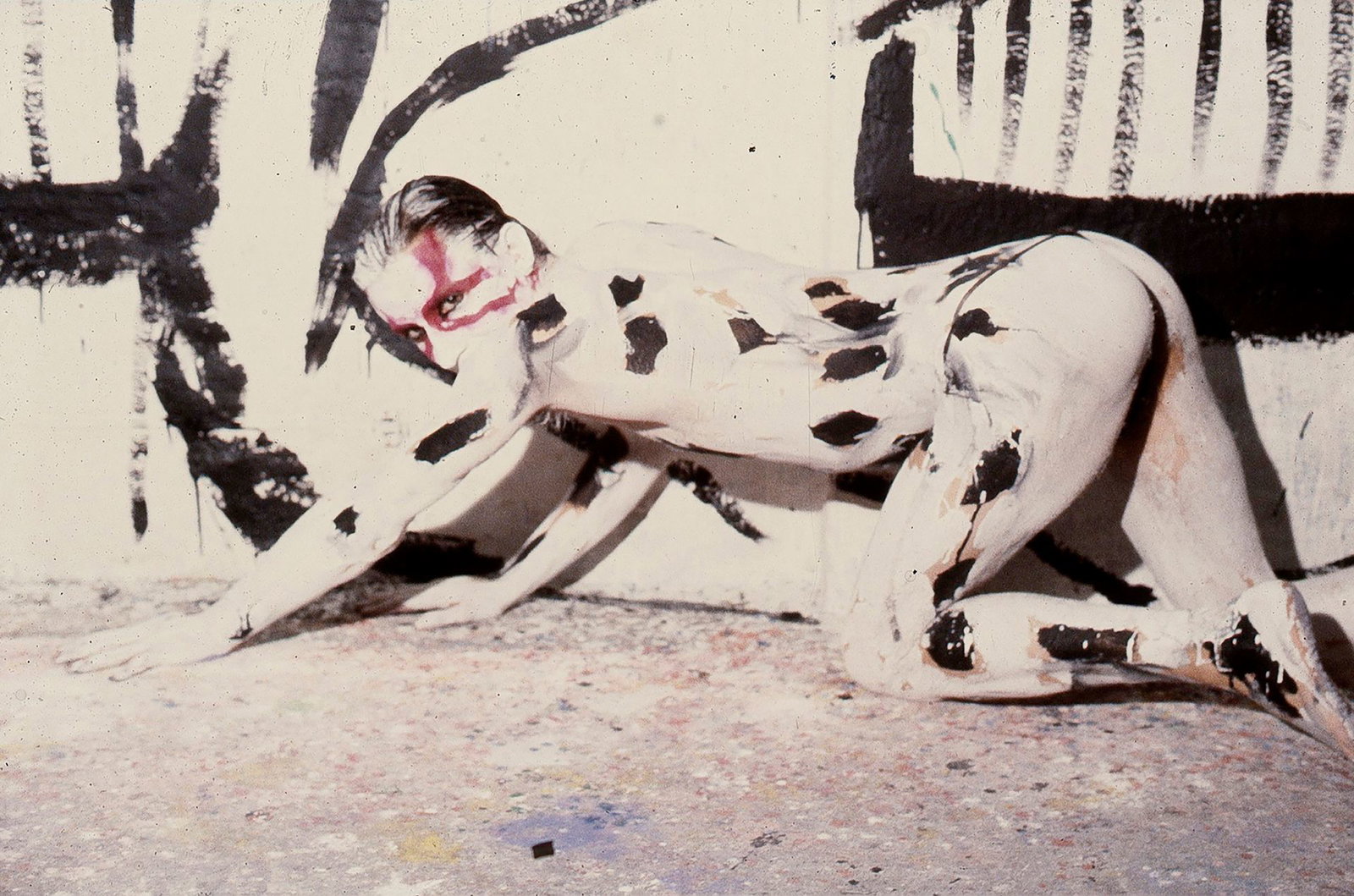 Photographer in full body paint for self-portrait