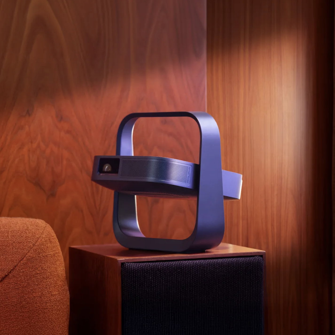 portable projector angled within square frame, like a fan