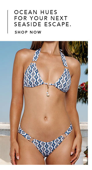 Blue tile print bikini with a bikini charm. 