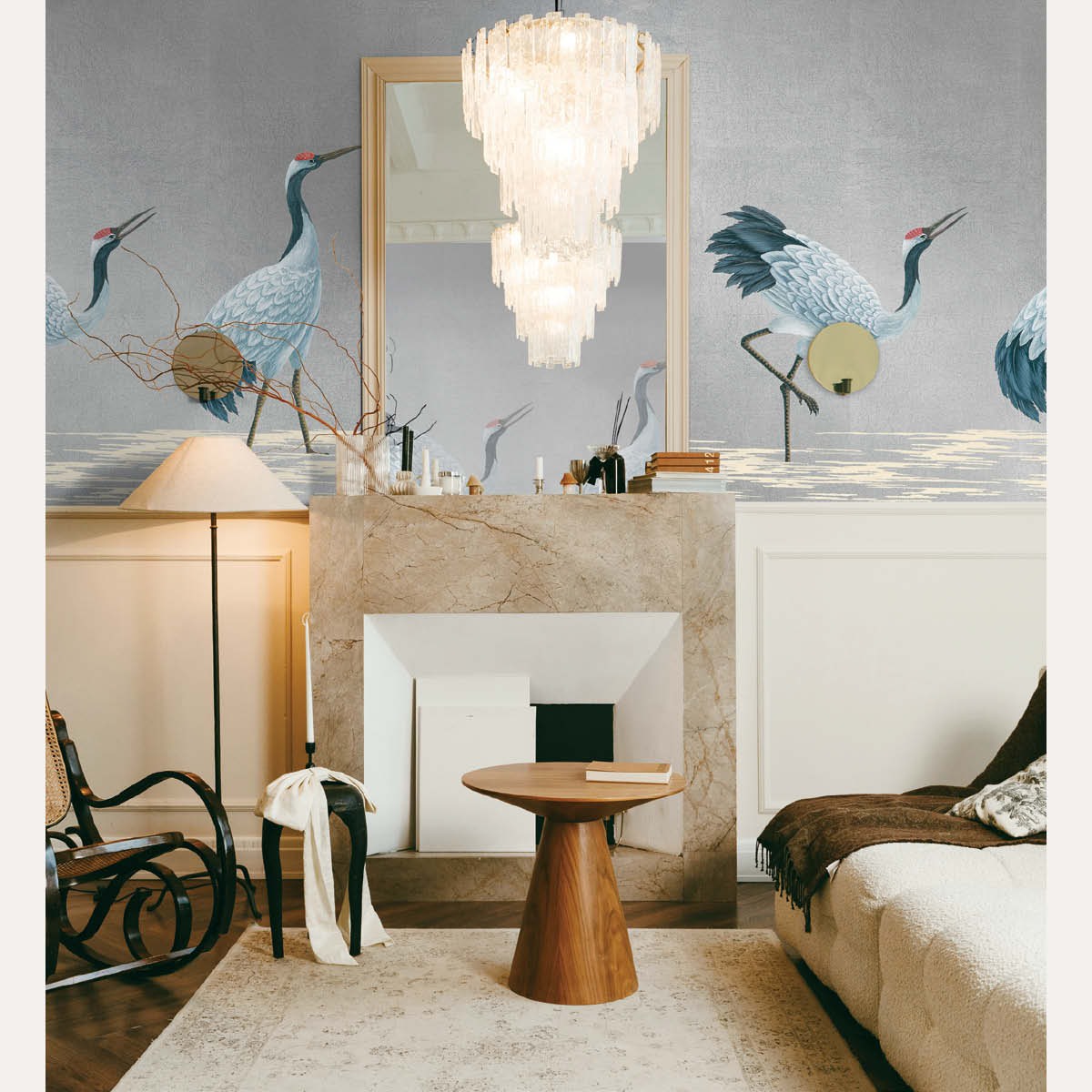 Image of Tempaper's Cranes mural in a living room behind a fireplace. 