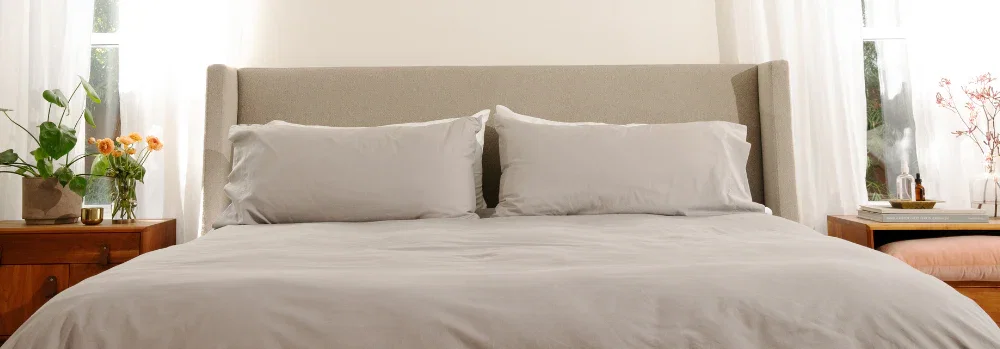 Bed made with Carolina Gray Heritage American Sheets.