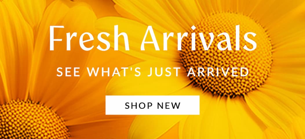 Bright yellow flowers with white text reading "Fresh Arrivals, see what's just arrived," and a button labeled "Shop New.