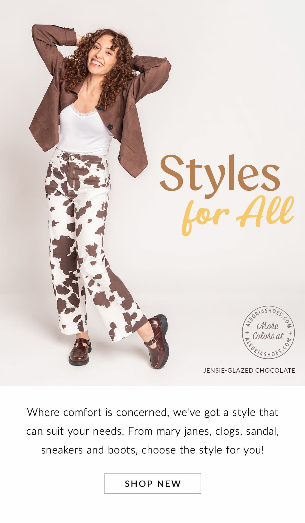 Model is posing in a white top, a brown jacket, and wide-leg trousers with a bold brown and white cow-print pattern. She wears dark brown leather Alegria Jensie Glazed Chocolate Mary Jane. 