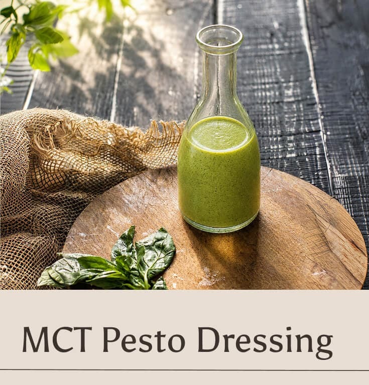 MCT Pesto Dressing in a glass jug