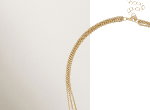 Collier doré multi-rang à pendentif