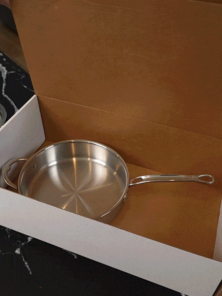 GIF: Kelly Scott unboxing Hestan cookware