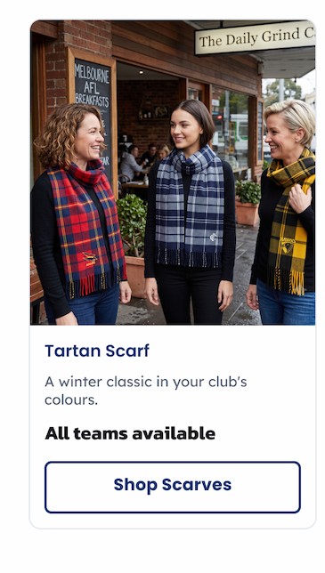 Three women outside a cafe wearing AFL Tartan Scarves