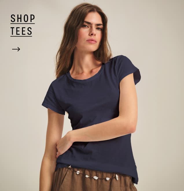 Image shows a model wearing the Odelia Tee in Navy.