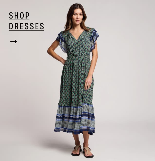 Image shows a model wearing the Cheryl Dress.
