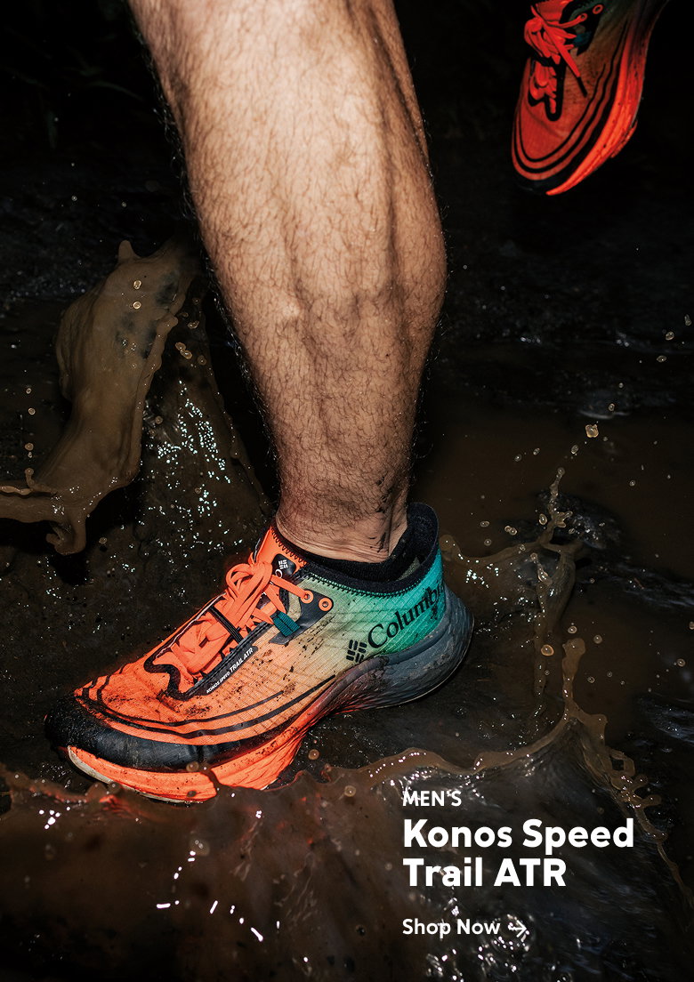 An image of a model running through mud in Konos Speed Trail ATR shoes 