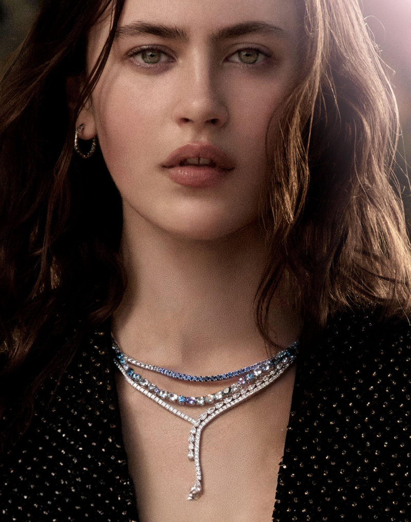 Model wearing three layered diamond and sapphire tennis necklaces. Unmistakably you. Click to Shop Necklaces