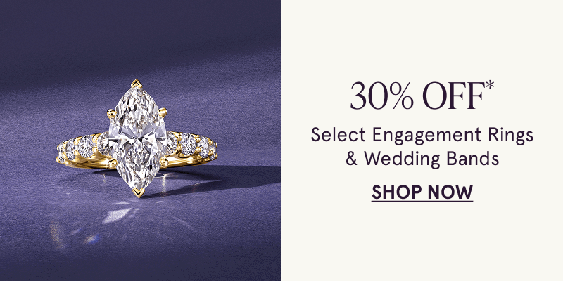 Gold-set marquise-cut stone diamond ring with eternity band. 30% OFF Select Engagement Rings & Wedding Bands. Click here to shop now