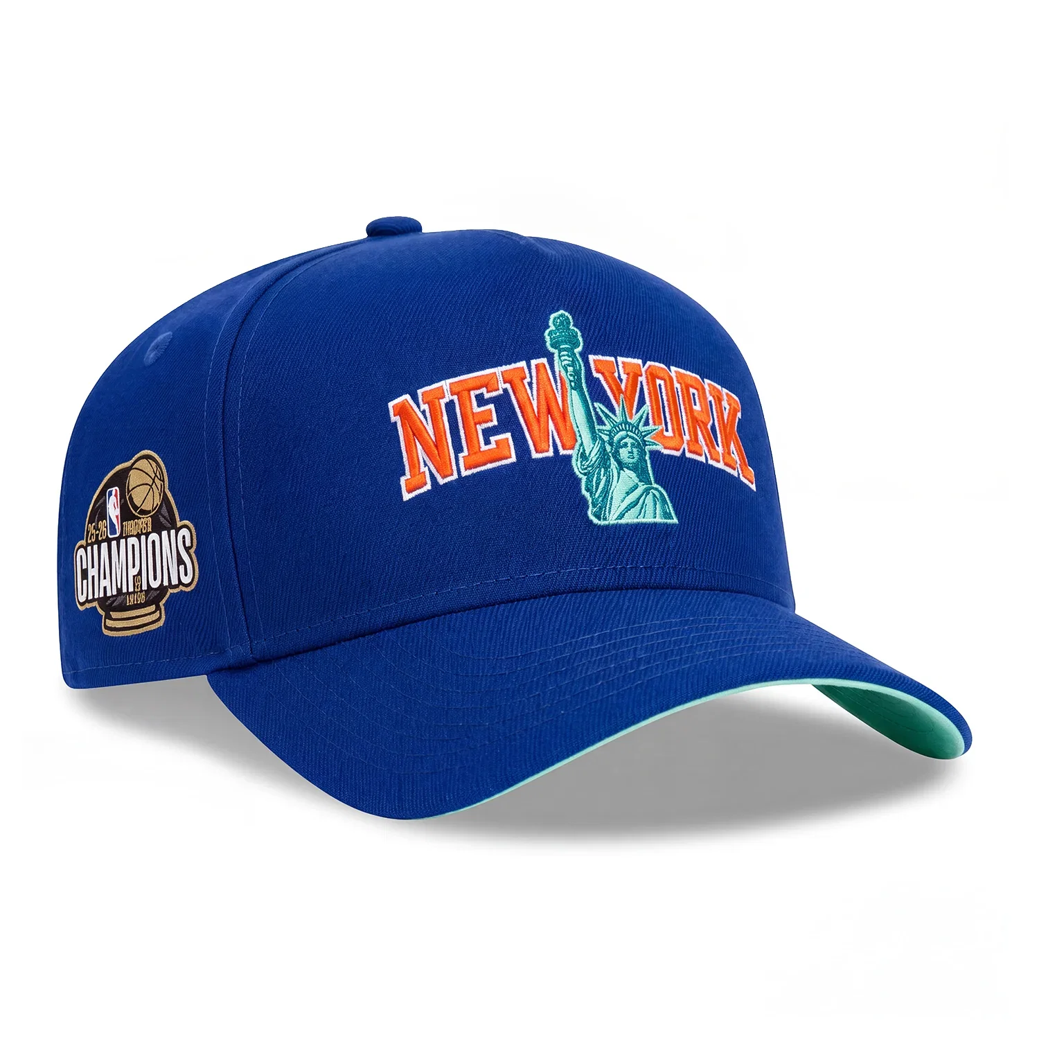 Image of Pre-Order New Era 9Forty A-Frame New York Knicks 2026 NBA Champions Patch Statue of Liberty Arch Mint UV Snapback Hat - Royal